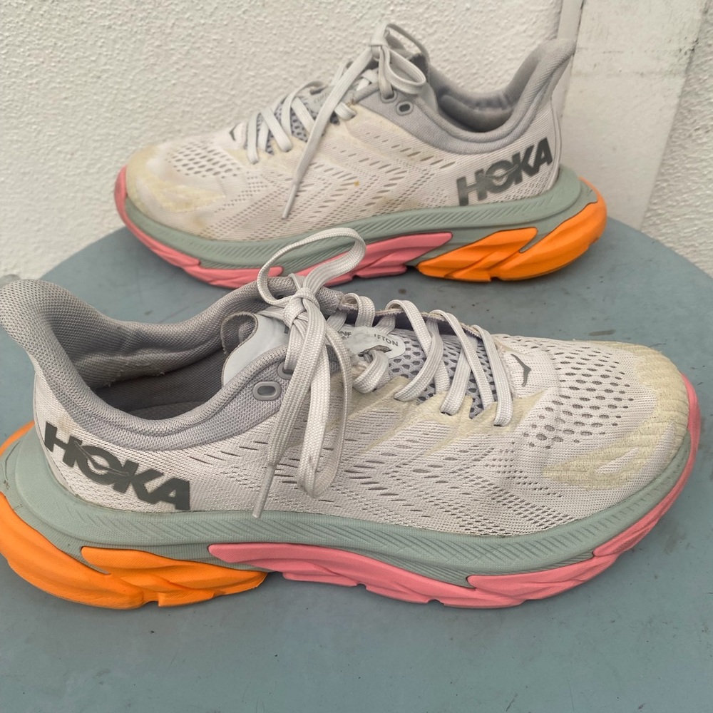 Hoka Women's Athletic Shoes in Light Gray with Pink and Orange Accents